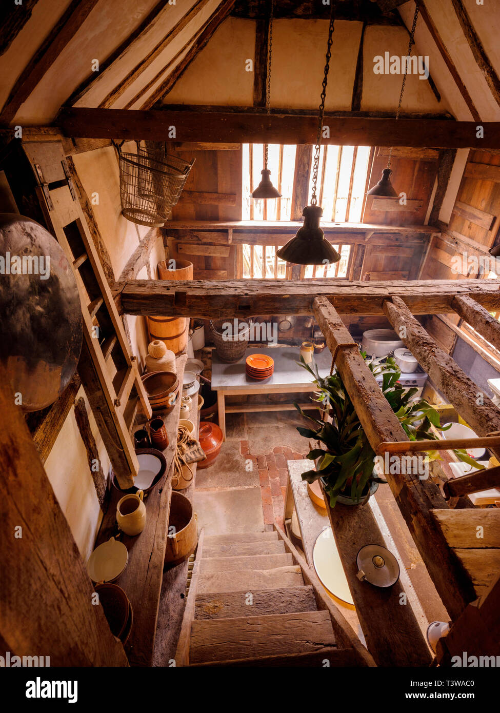 Alastair Hendy and his restored tudor home in Old Town Hastings, East Sussex UK. Stock Photo