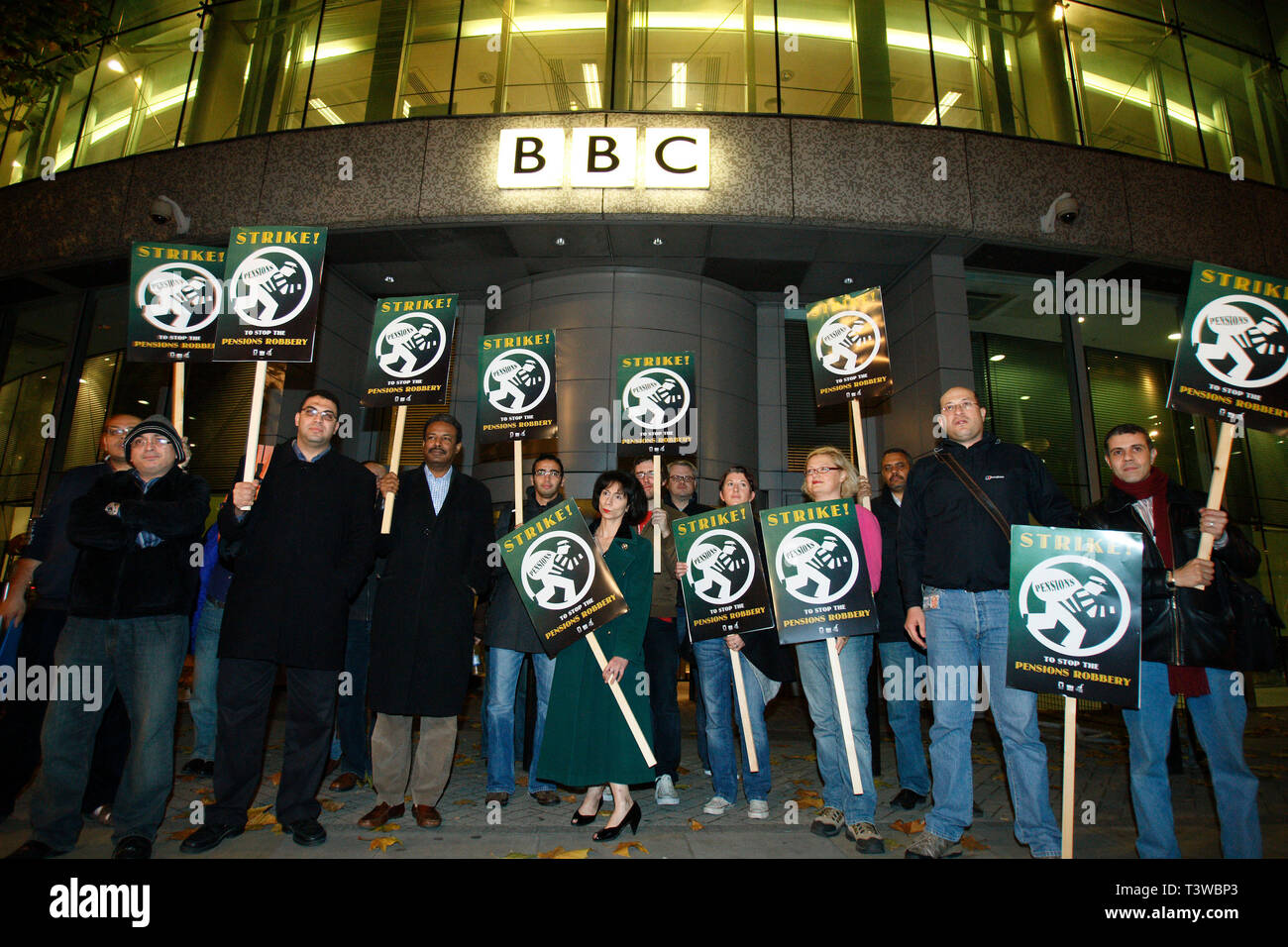 BBC journalists walk out at midnight in the first of two strikes in protest at planed changes to their pensions scheme. BBC Television Centre, London. Stock Photo