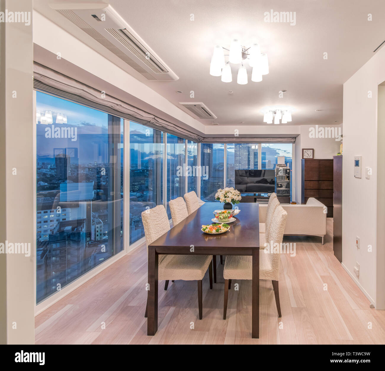 Dining Table And Chairs In Modern Apartment Stock Photo Alamy