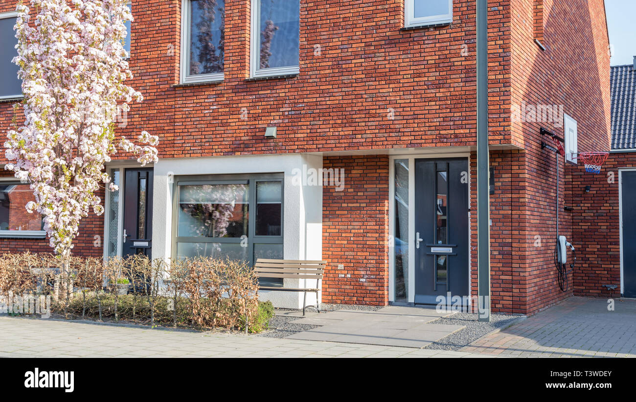Newly built houses in a family friendly modern suburban neighborhood with solar panels en