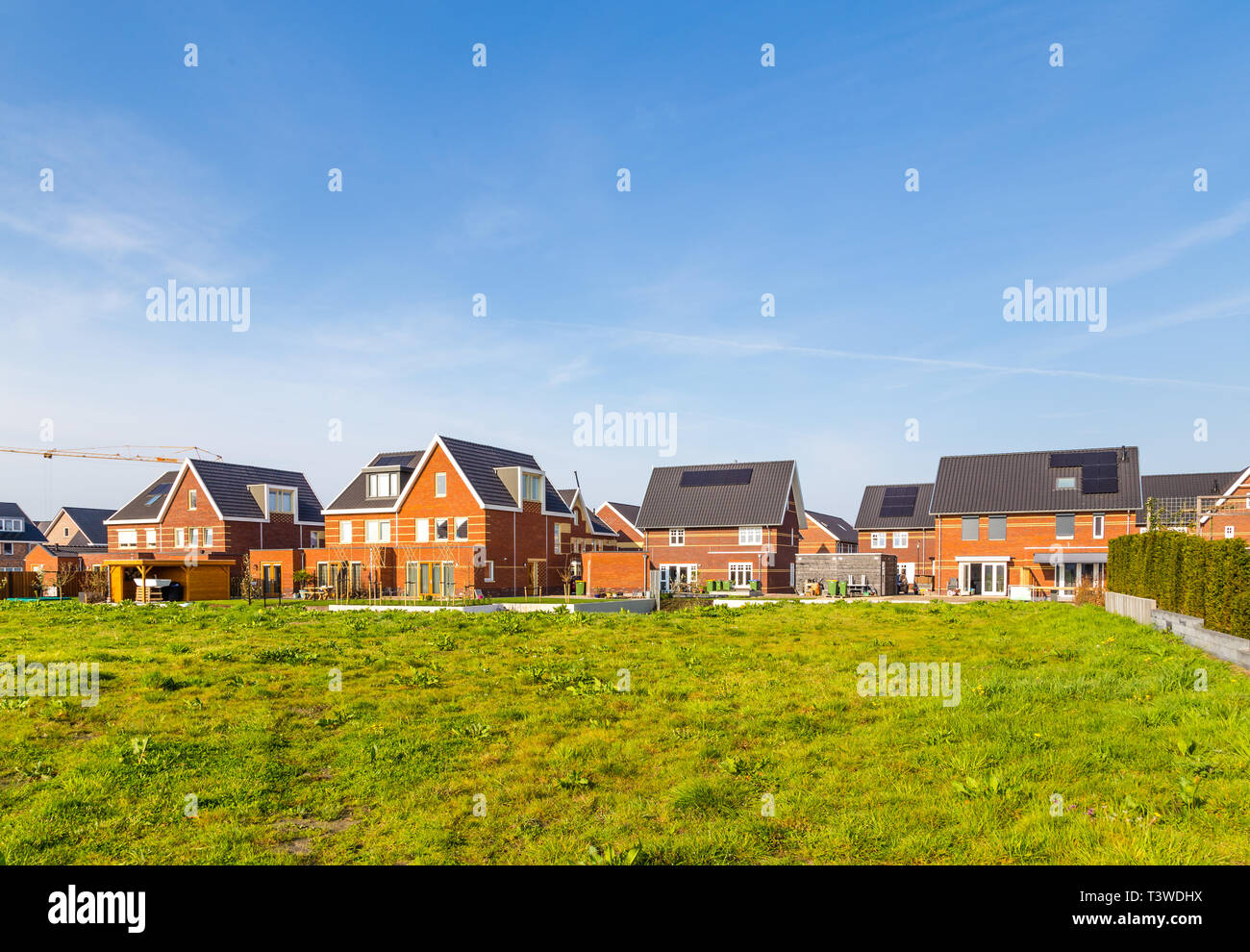 Modern newly built houses in a family friendly suburban neighborhood in Veenendaal in the