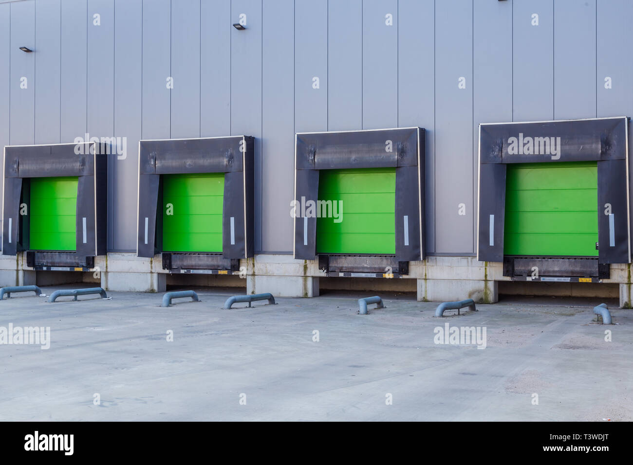 Loading Ramp Door Green loading ramp doors for loading trruck at a distribution center ...