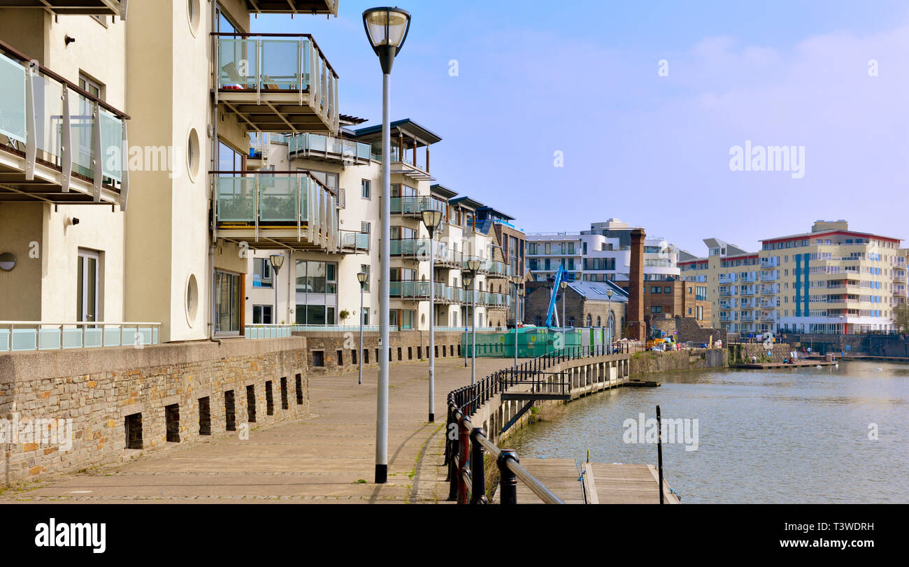 Modern purpose build apartments and flats overlooking Bristol floating harbour near city centre, England Stock Photo