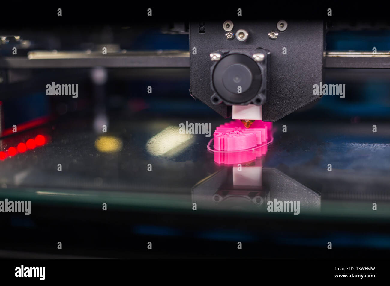 Three dimensional printing machine prints physical 3D model Stock Photo ...