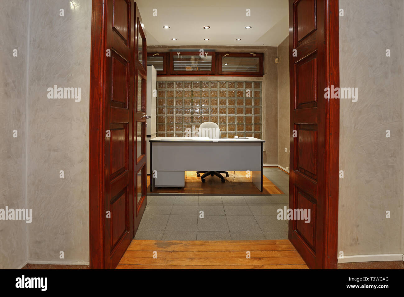 Small Office Interior With Work Desk Through Door Stock Photo Alamy