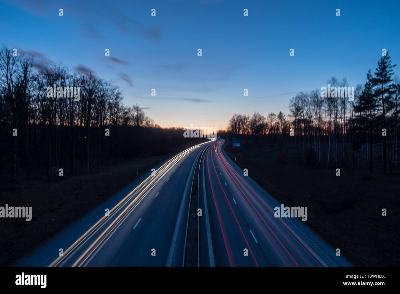 Headlights and taillights of cars driving on the highway Stock Photo