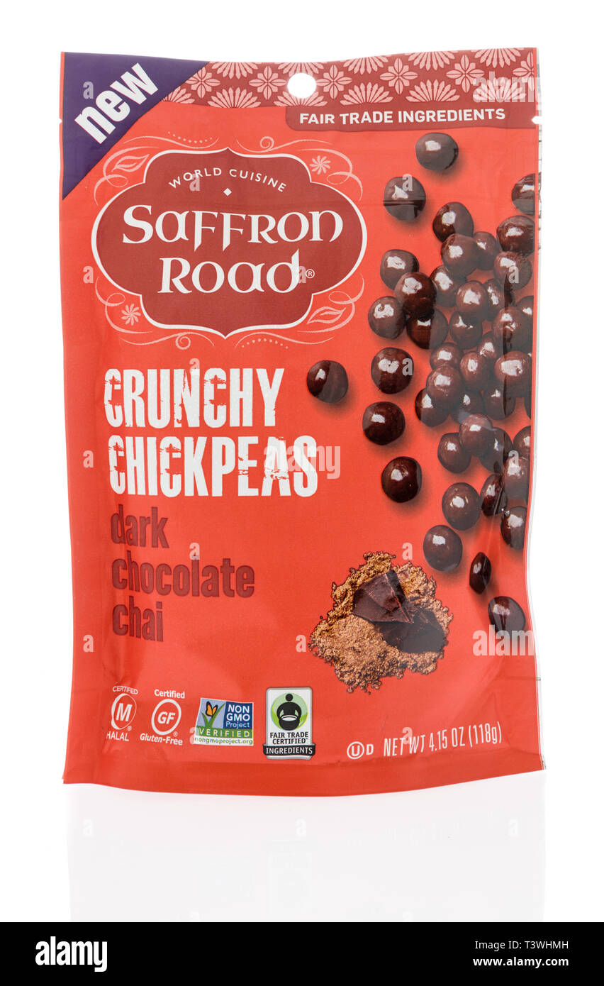 Winneconne, WI -  3 April 2019: A package of World cuisine saffron road crunchy chickpeas with dark chocolate chai on an isolated background Stock Photo