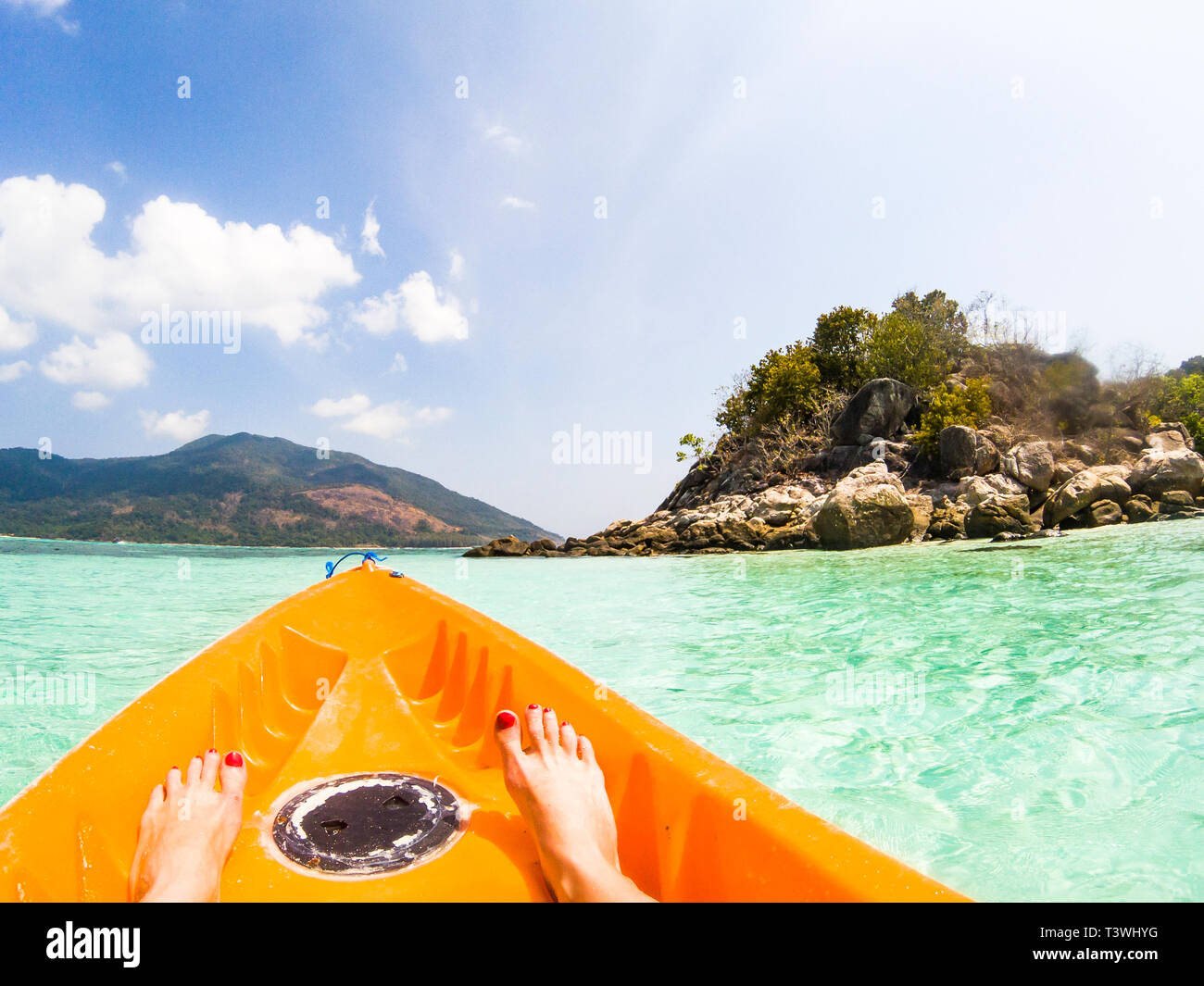 kayaking in crystal clear tropical waters kayak heading to isolated