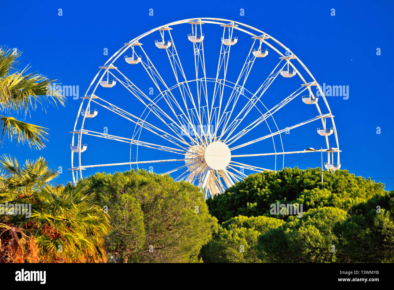 Giant Ferris wheel in Antibes colorful view, landmarks of French riviera, Alpes Maritimes department of France Stock Photo