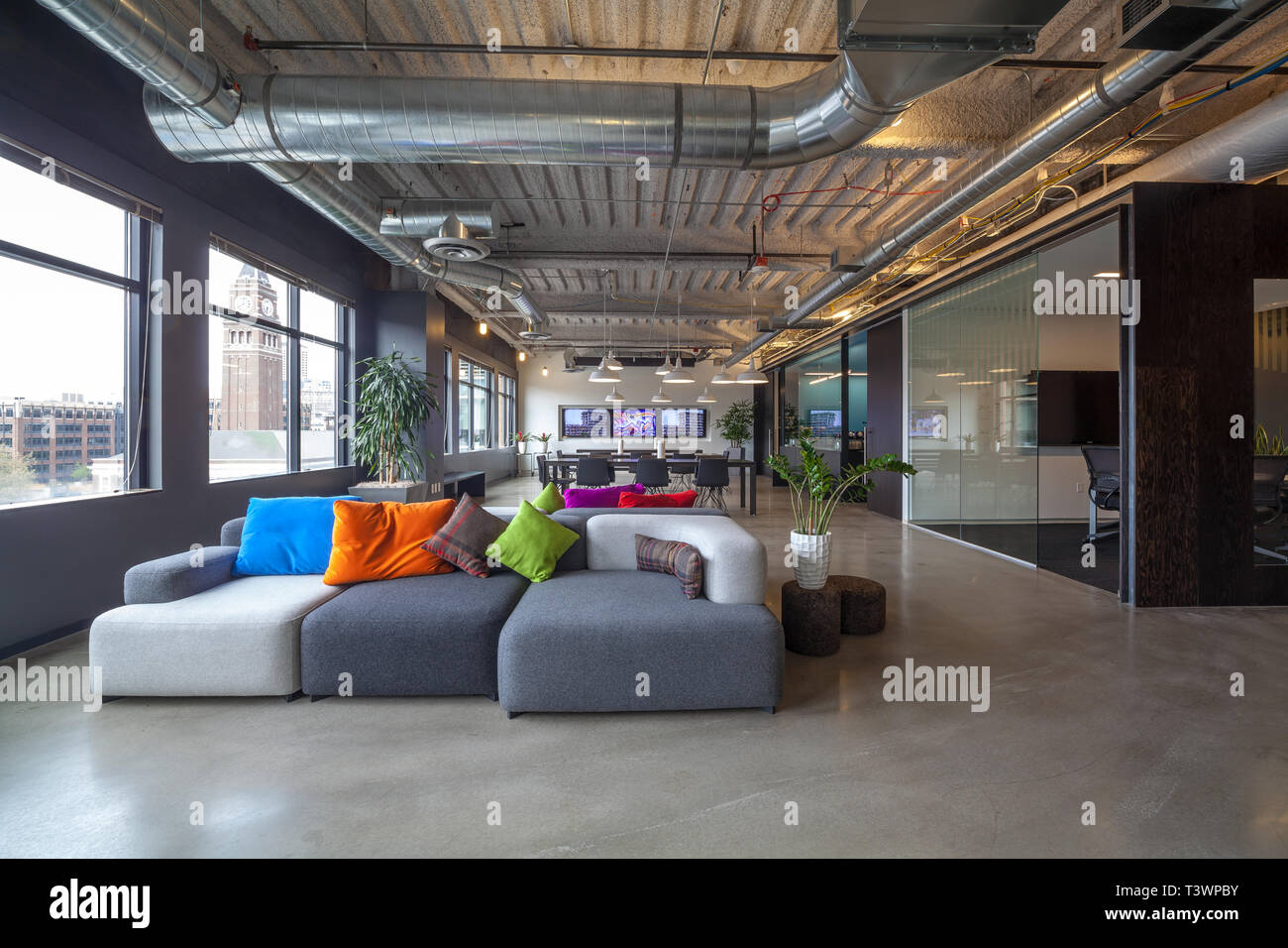 Sofas in office seating area Stock Photo Alamy