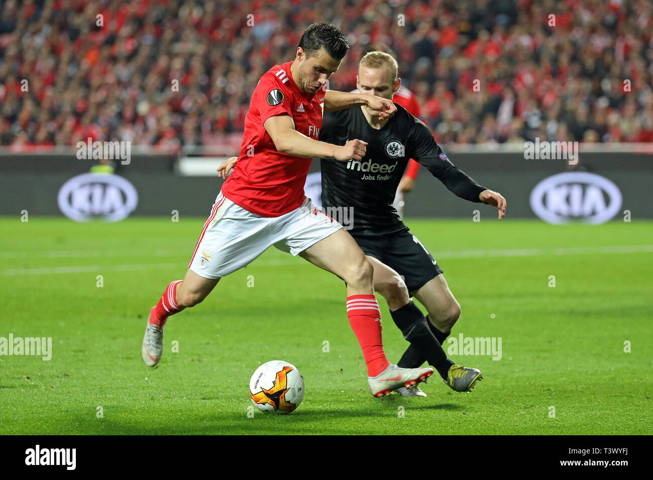 Sébastien Corchia of SL Benfica (L) vies for the ball with Sebastian Rode of Eintracht Frankfurt (R) during the UEFA Europa League 2018/2019 football match between SL Benfica vs Eintracht Frankfurt.  (Final score: SL Benfica 4 - 2 Eintracht Frankfurt) Stock Photo