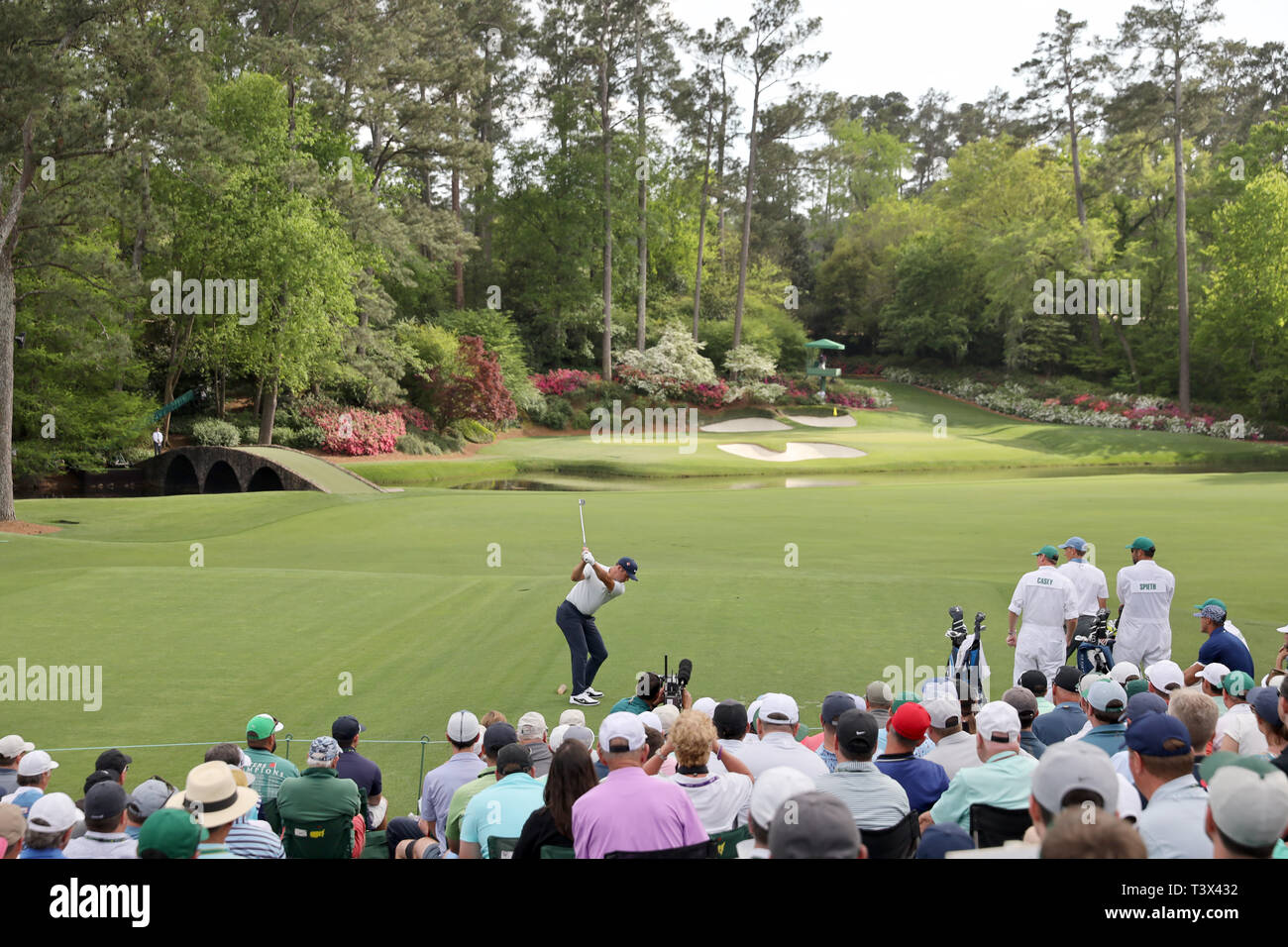 England's Paul Casey plays a shot on the 12th hole during the first round  of the 2019 Masters golf tournament at the Augusta National Golf Club in  Augusta, Georgia, United States, on