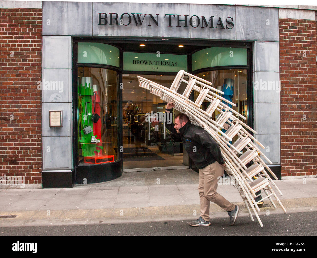Cork City, Cork, Ireland. 12th April, 2019. David O' Driscoll, Kilkully carrying chairs down Maylor Street for delivery to the Brown Thomas department Store in Cork, Ireland. Credit: David Creedon/Alamy Live News Stock Photo