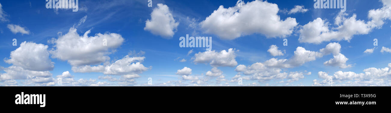 Cloudscape - Blue sky and white clouds, panorama Stock Photo - Alamy