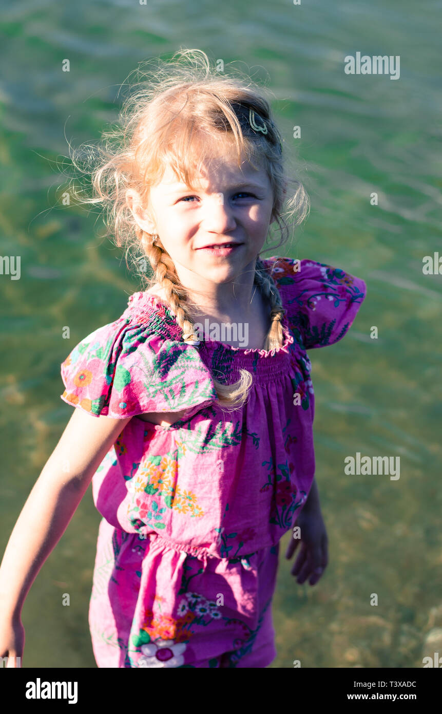 Blond little girl in summer hi-res stock photography and images - Alamy