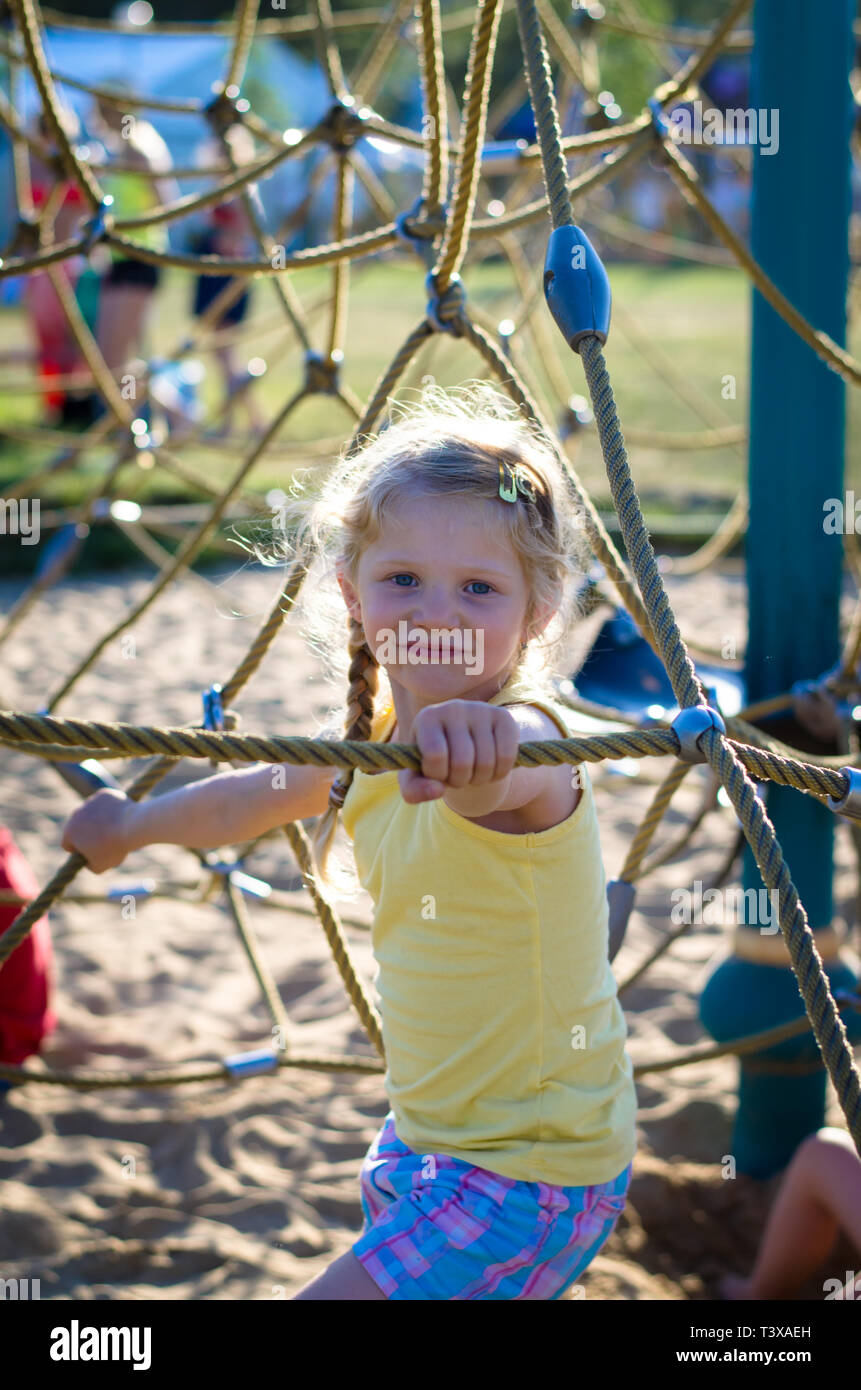 Playing in playground hi-res stock photography and images - Alamy
