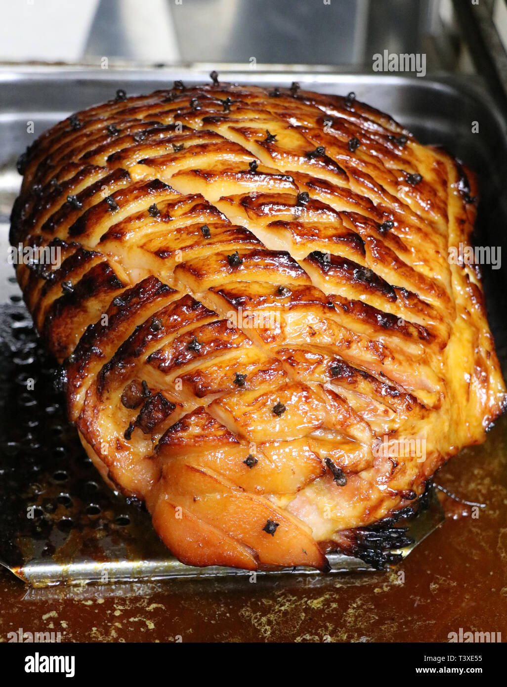 slow roasted gammon in the oven Stock Photo Alamy