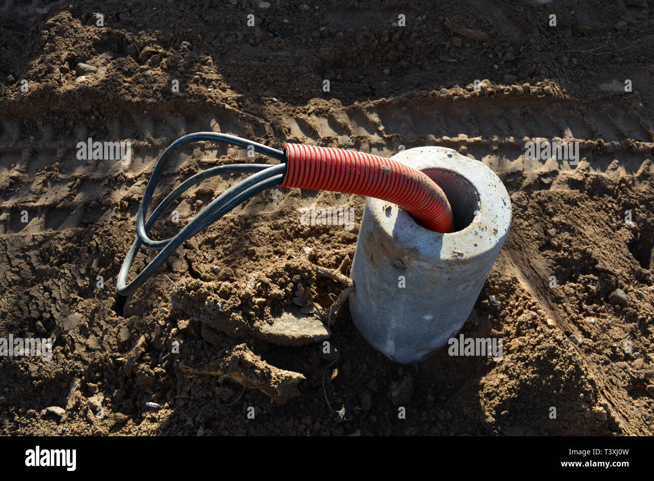 Underground cable entry during construction base fixed with Concrete foundation Stock Photo