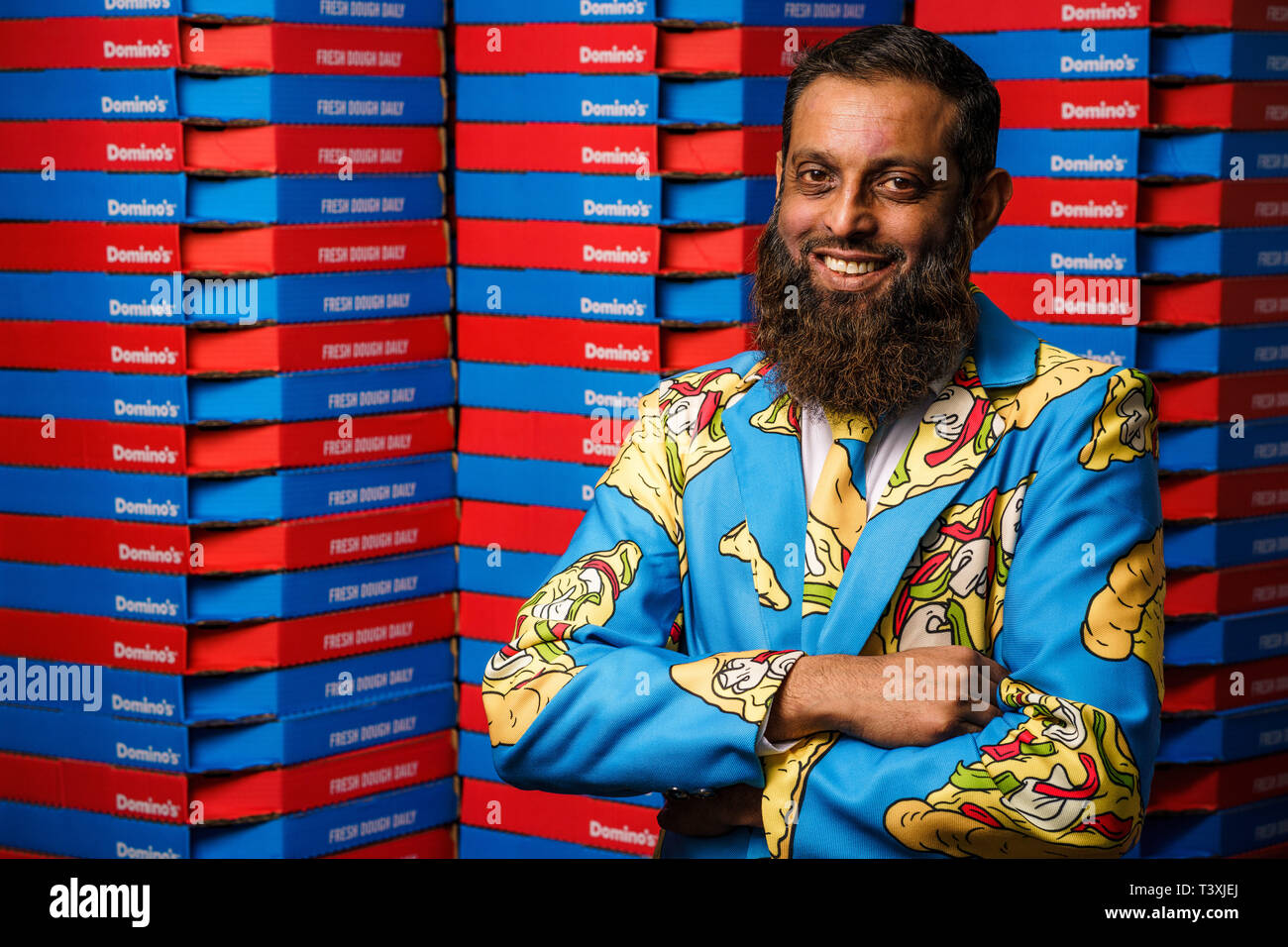 Suits you Sir pizza tycoon Arshad Yasin opens Domino’s 1,100th store