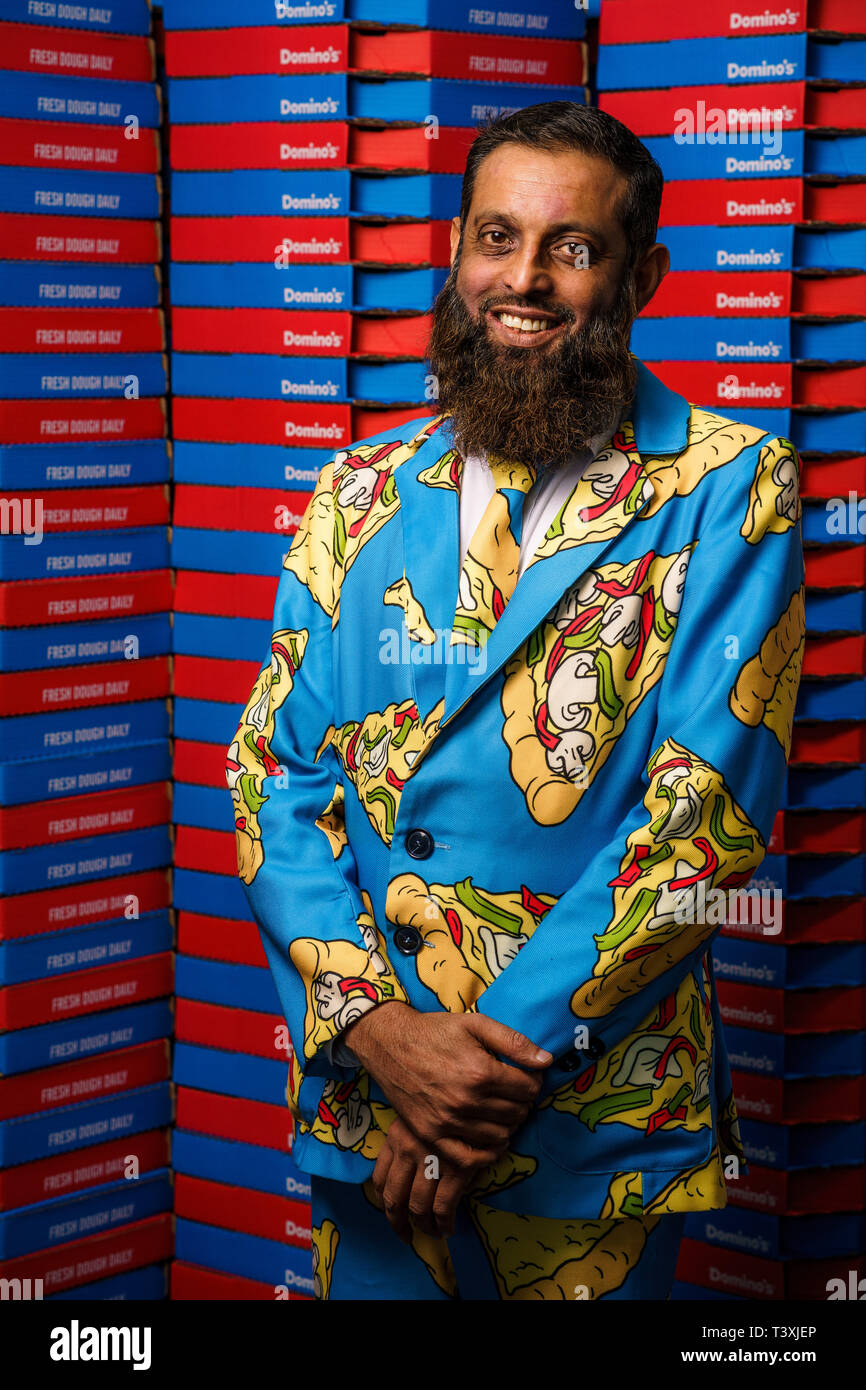 Suits you Sir – pizza tycoon Arshad Yasin opens Domino's 1,100th store in a  special '3-pizza' suit. The 49-year old entrepreneur, who owns Domino's  first UK store in Luton, celebrated his 20th