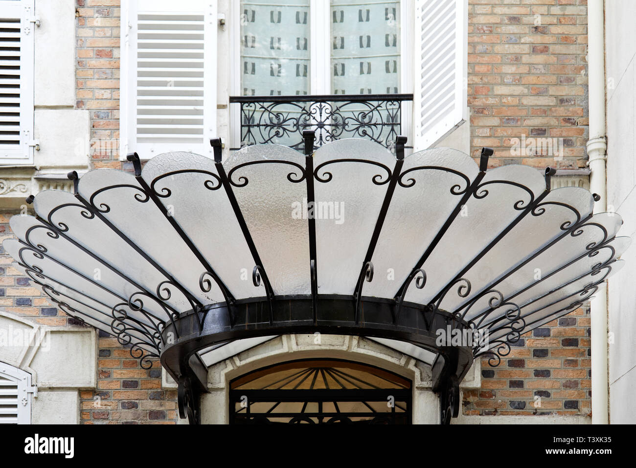PARIS, FRANCE - JULY 23, 2017: Art Nouveau canopy in glass and black wrought iron in Paris, France Stock Photo