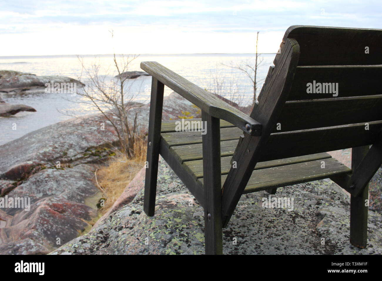 A Chair On A Rock By A Lake In Spring Stock Photo 243375595