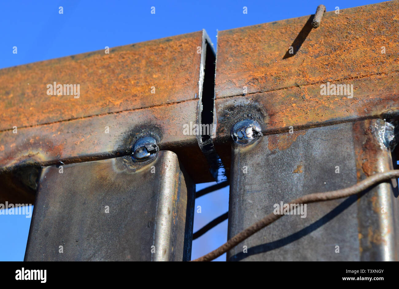 Connection by welding of metal square pipes. Welding seam Stock Photo ...