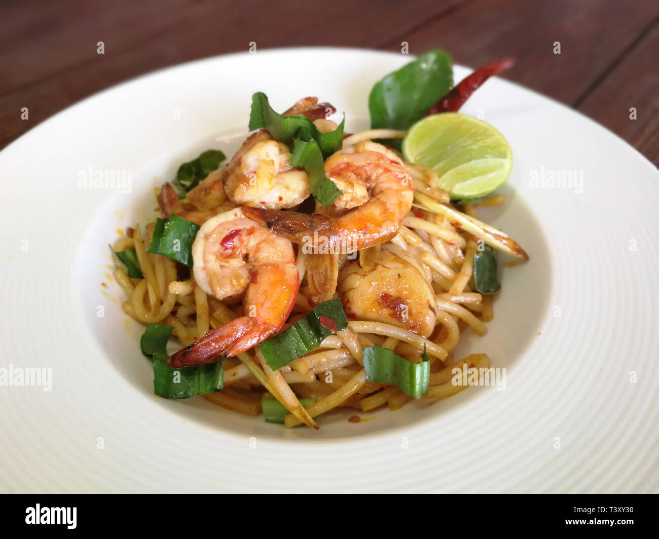 Spaghetti seafood with spicy chili Seafood Thai Style (Spaghetti Pad