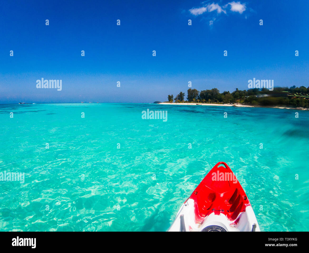 kayaking in crystal clear tropical waters kayak heading to isolated