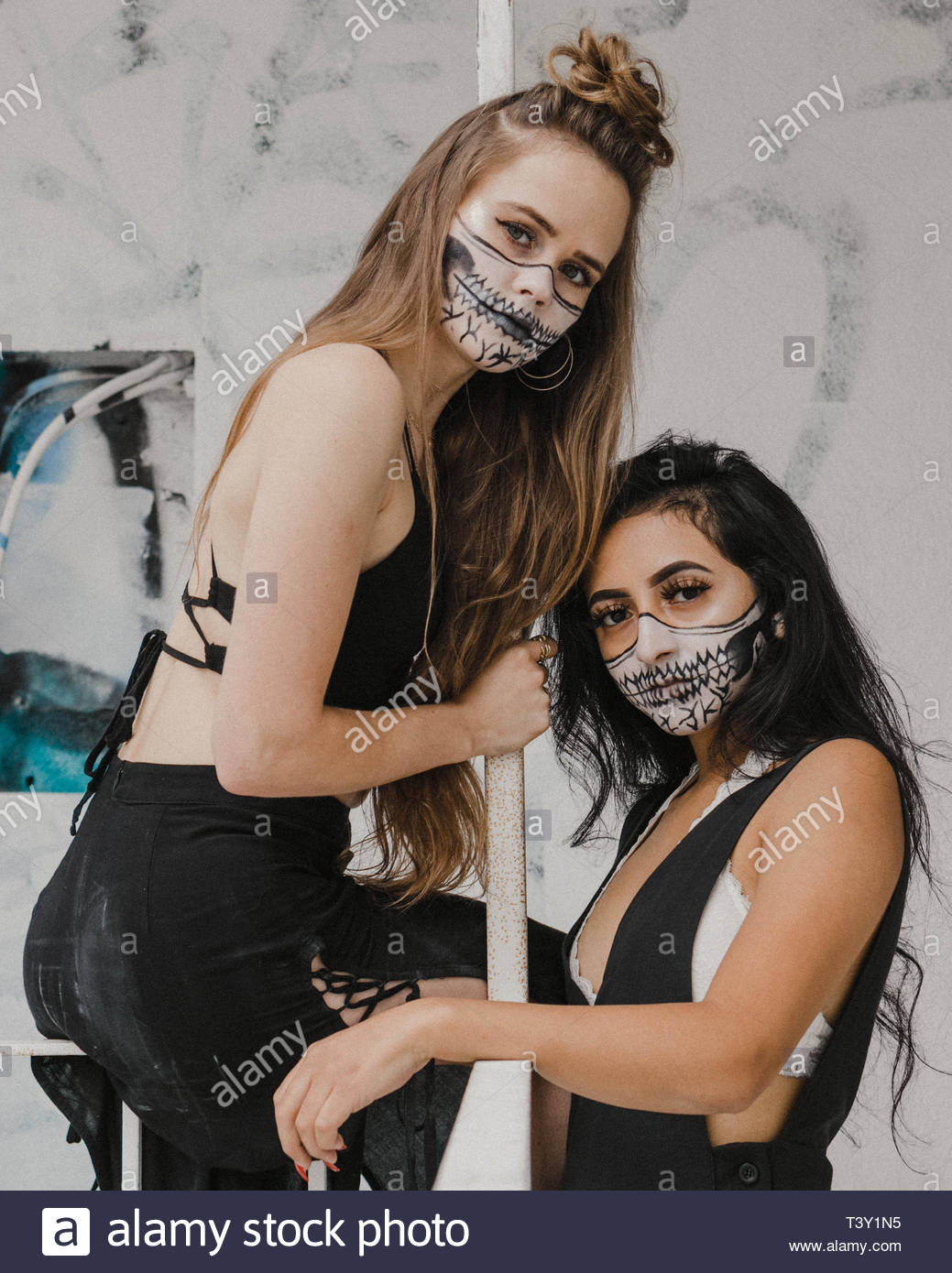 Two Women With Skull Hand Tattoo Stock Photo 243383201 Alamy
