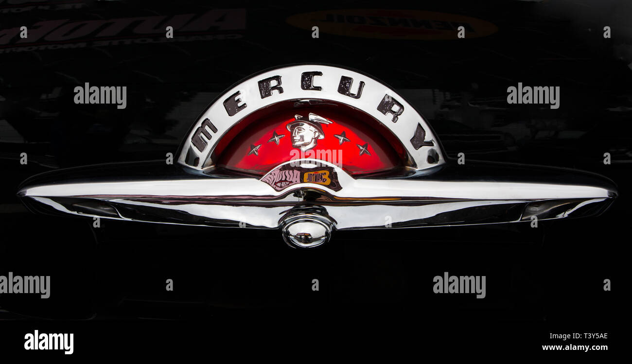 CONCORD, NC (USA) - April 6, 2019:  Closeup of a 1951 Mercury automobile nameplate on display at the Pennzoil AutoFair Classic Car Show at Charlotte M Stock Photo