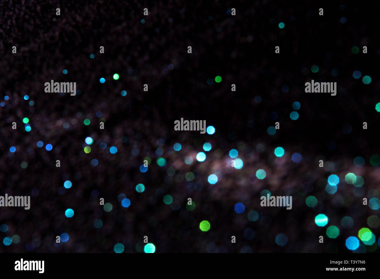Blue and green bokeh lights on a black background Stock Photo - Alamy