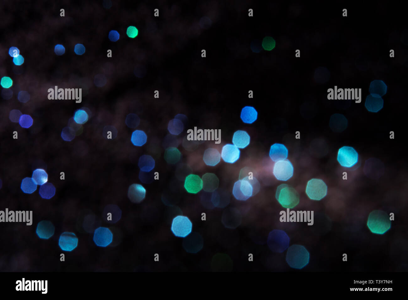 Blue and green bokeh lights on a black background Stock Photo - Alamy