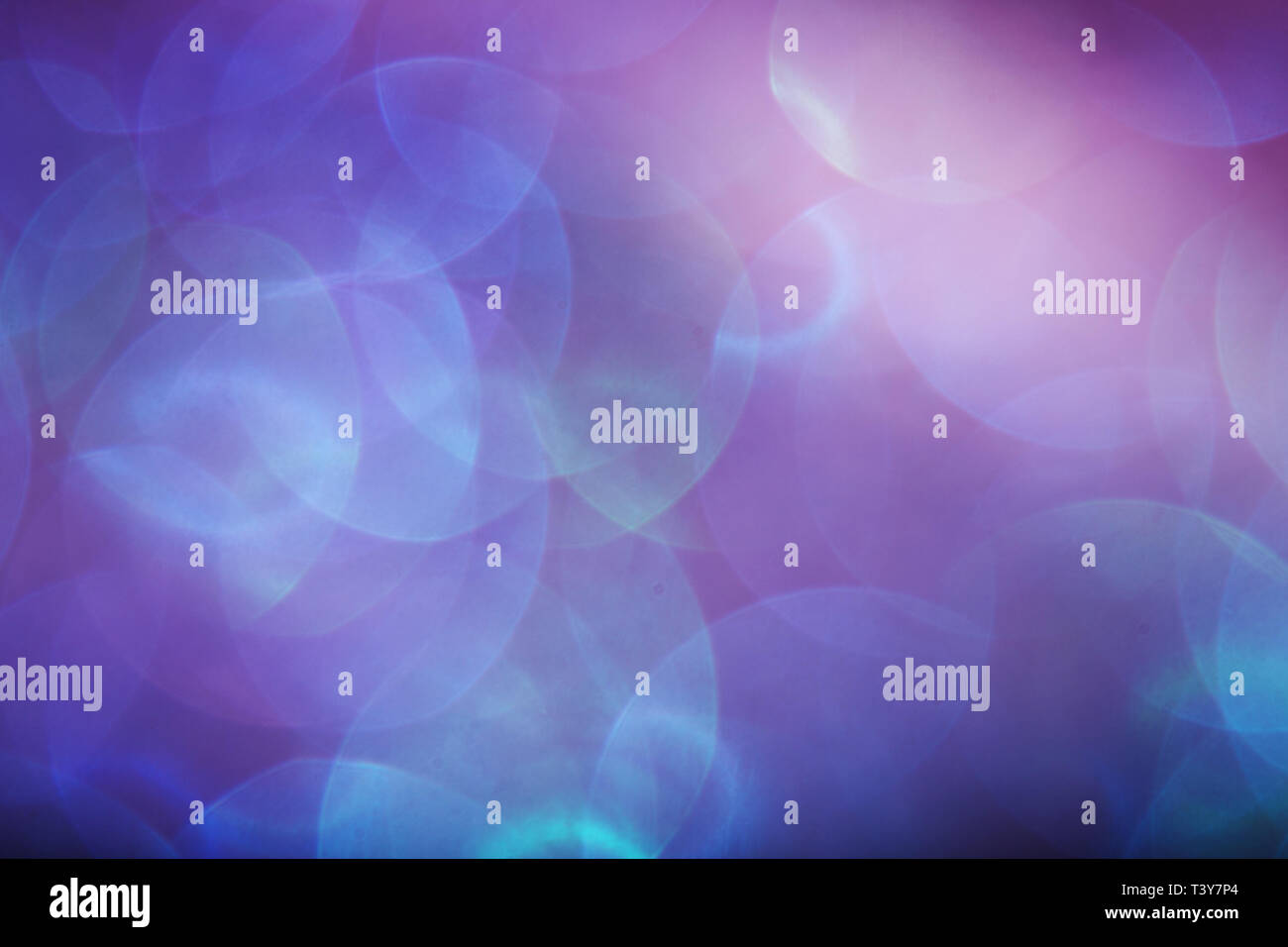 Blue and green bokeh lights on a black background Stock Photo - Alamy