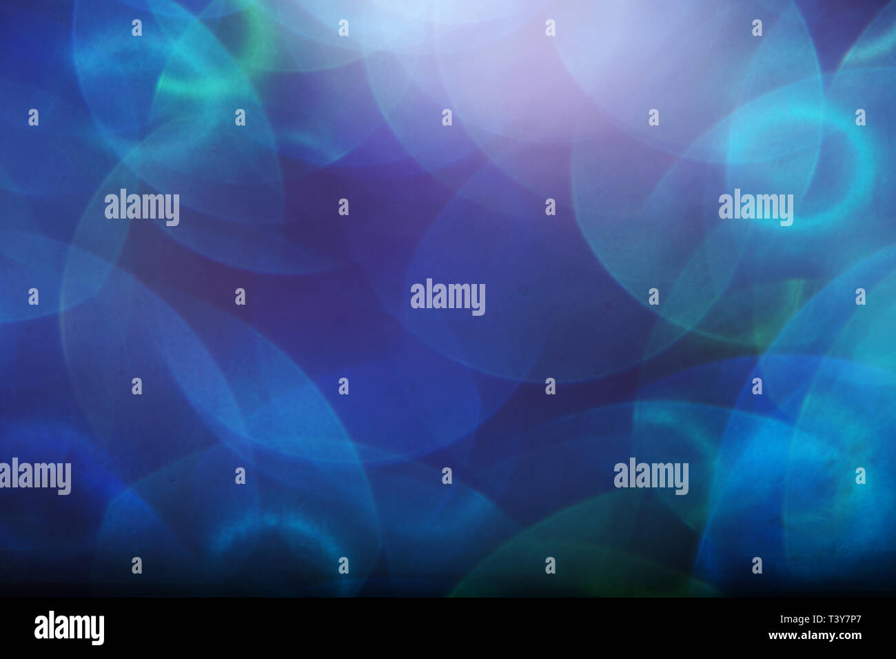 Blue and green bokeh lights on a black background Stock Photo - Alamy