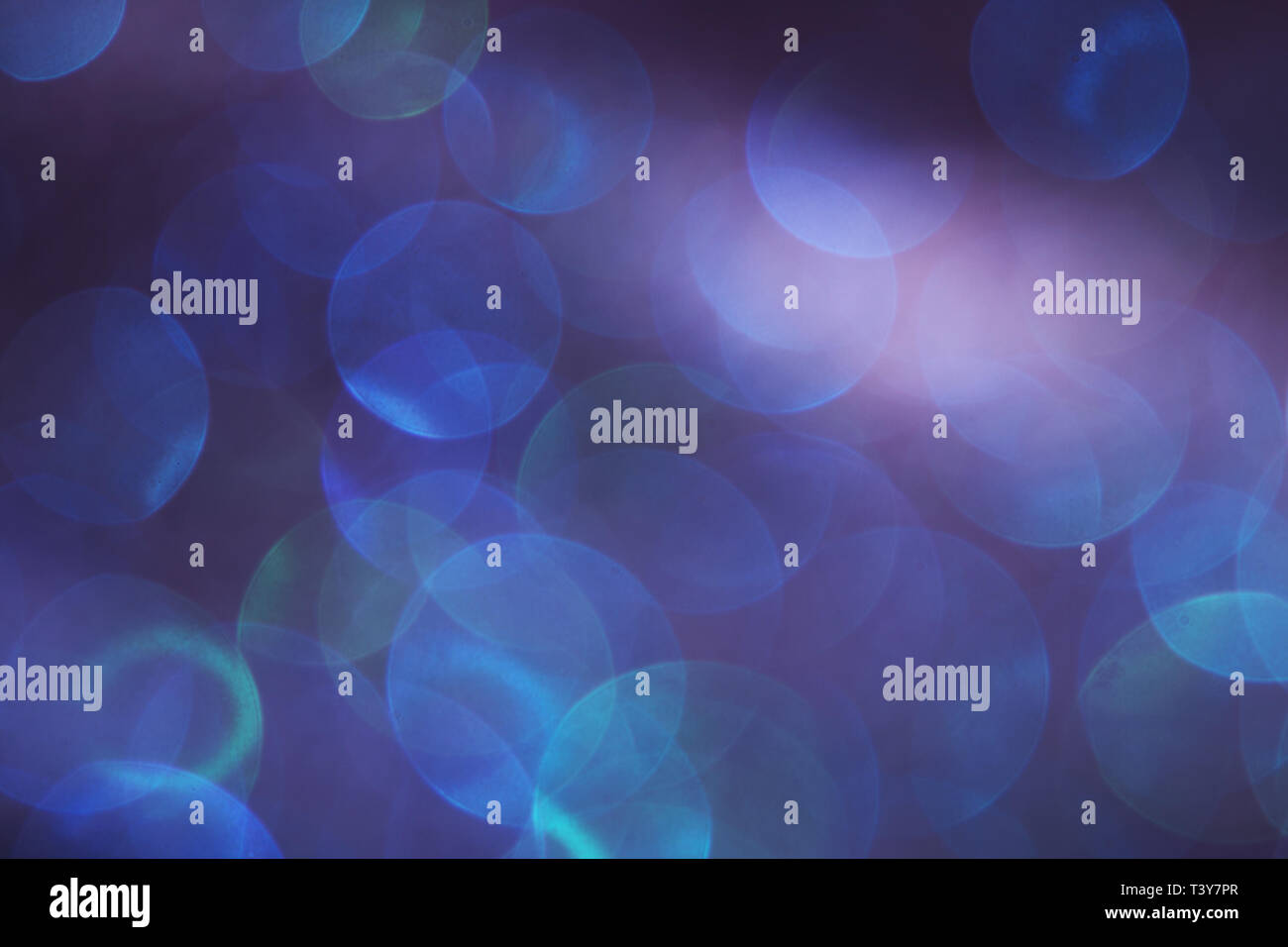 Blue and green bokeh lights on a black background Stock Photo - Alamy