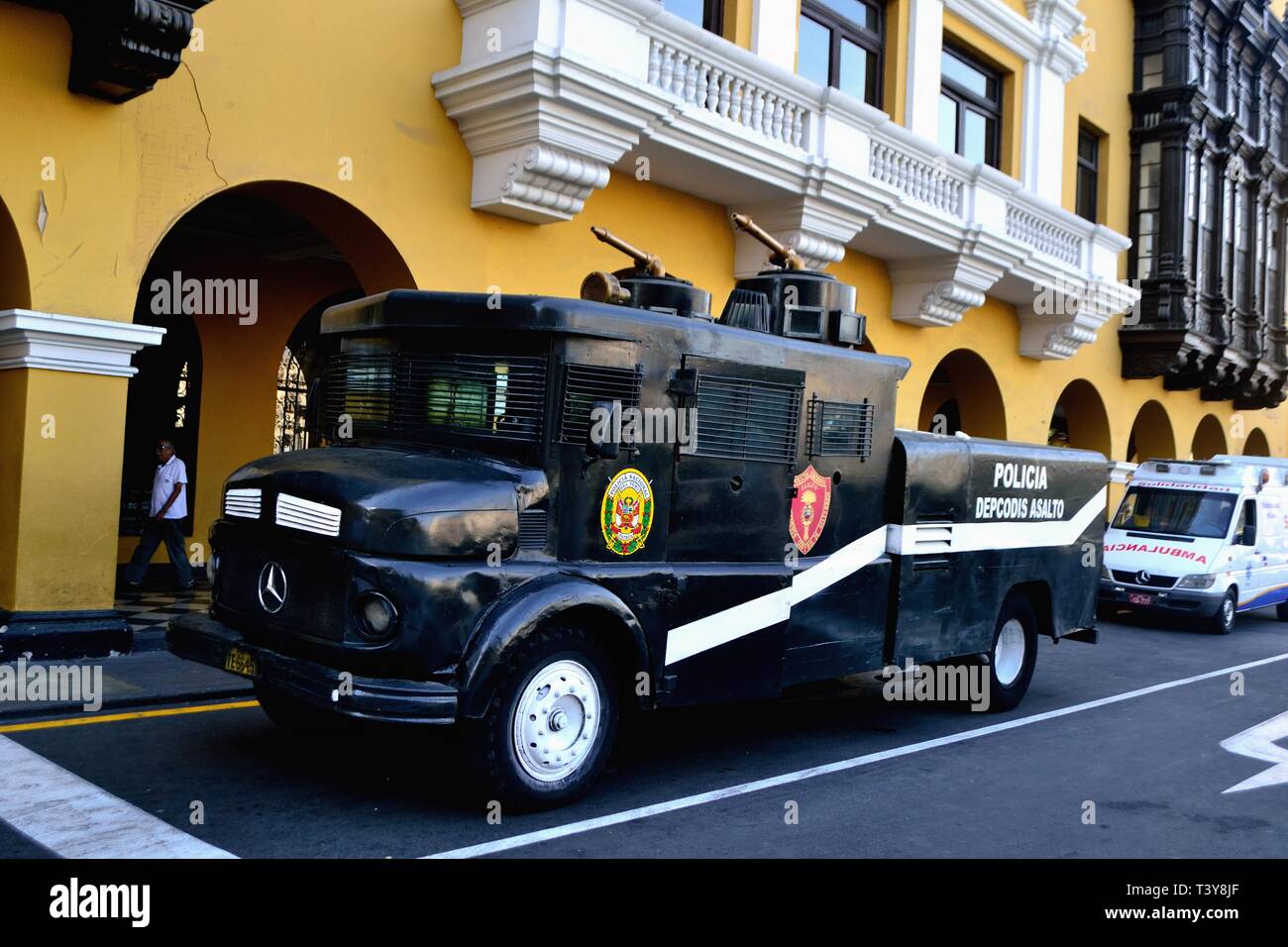 Police riot truck with water cannon  - Plaza de Armas in LIMA.-.PERU       											  					  			 	  	  			 	    	 Stock Photo