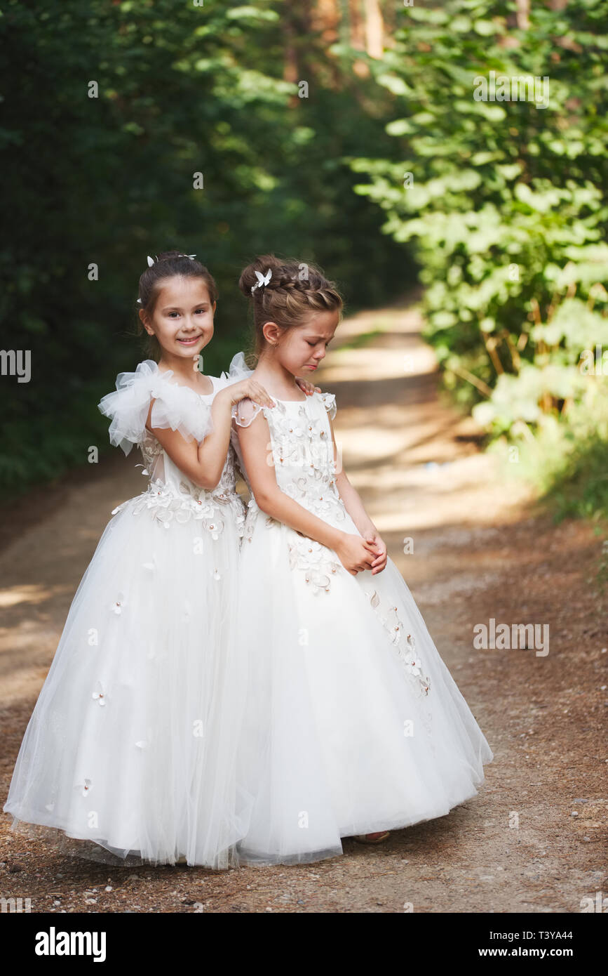 happy beautiful girls with white wedding dresses Stock Photo