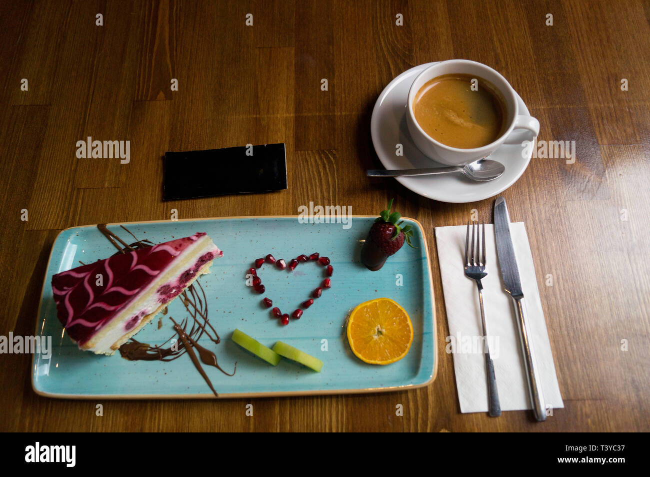 In carefully crafted serving tray cake and sweets Stock Photo Alamy