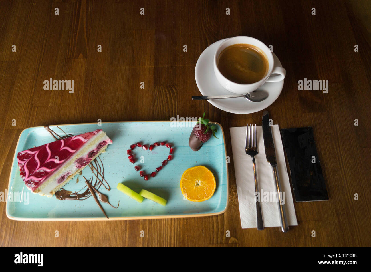 In carefully crafted serving tray cake and sweets Stock Photo Alamy