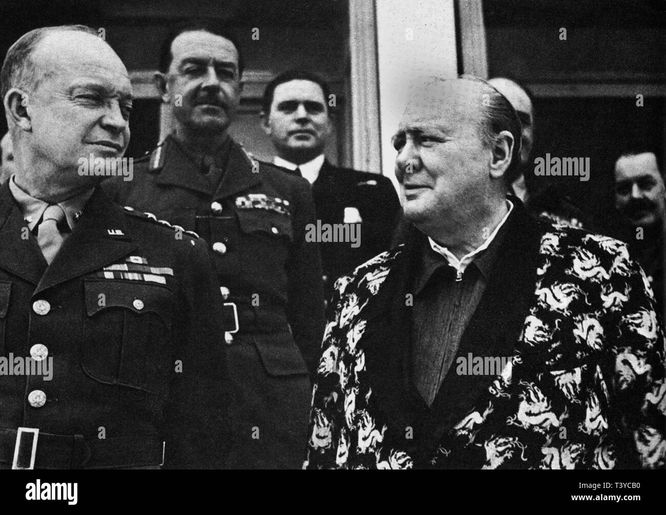 Winston Churchill with Generals Eisenhower and Alexander at  Carthage, Tunisia, recovering from a bout of pneumonia. December 1943. Stock Photo