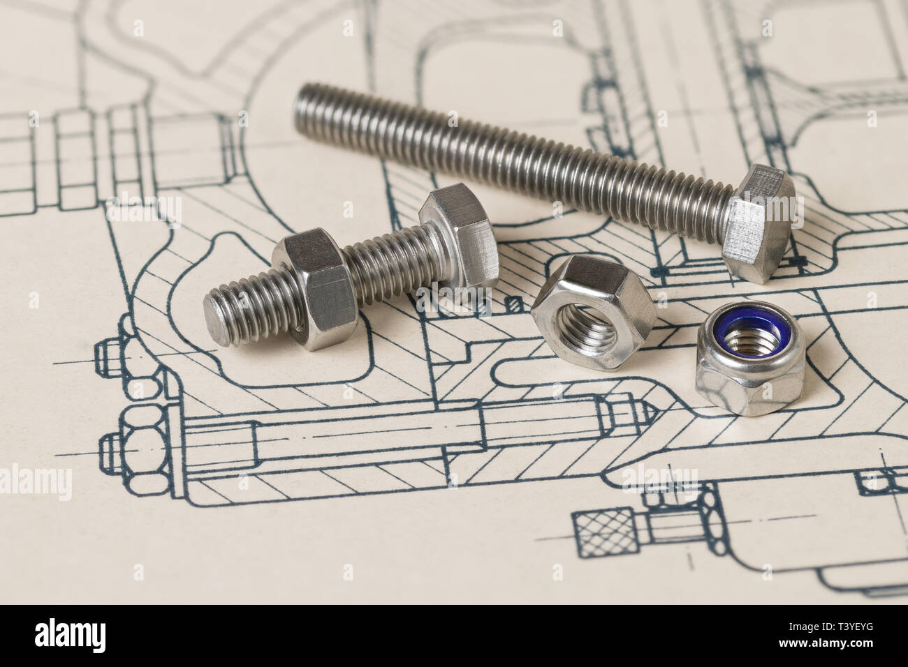 Metal bolts. Nuts group. Hatched drawing. Technical drafting. Steel screws. Threaded parts with hexagonal head. Blue lock washer. Professional project. Stock Photo