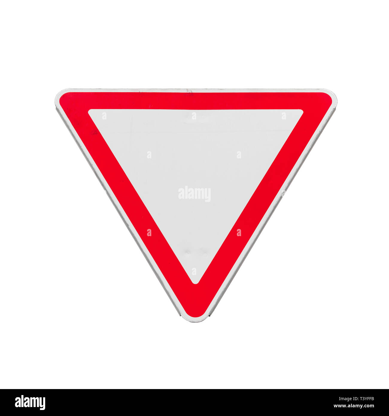 Give way, triangle road sign isolated on white background, close up photo Stock Photo