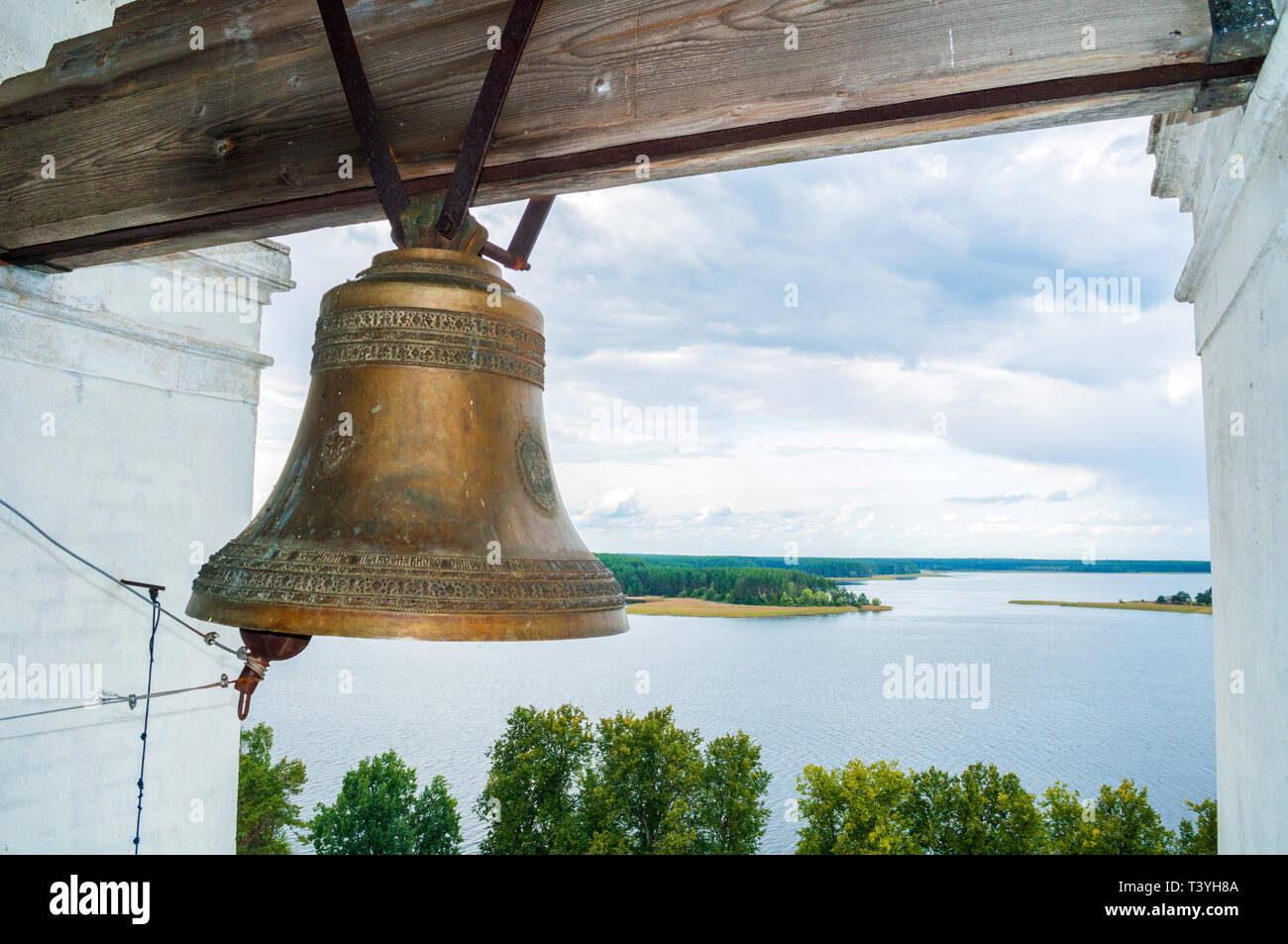 Travel landscape of Tver region and the Seliger lake, Russia. Nilo-Stolobensky Monastery, view from from height, focus at the bell Stock Photo