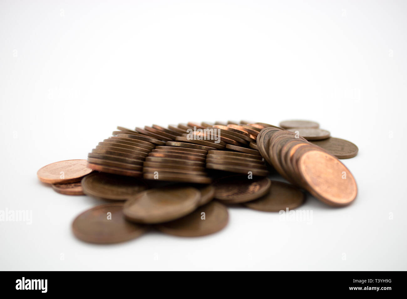 Bronze coins on white background. Coins of five euro cents. Savings Stock Photo Alamy