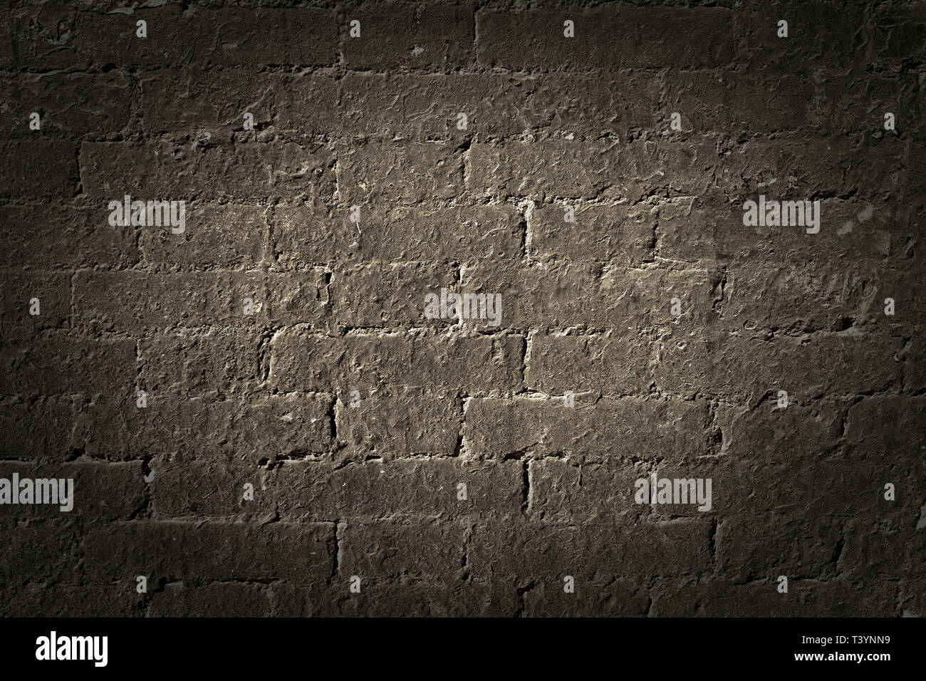 Old brick wall grunge background texture black vignette Stock Photo