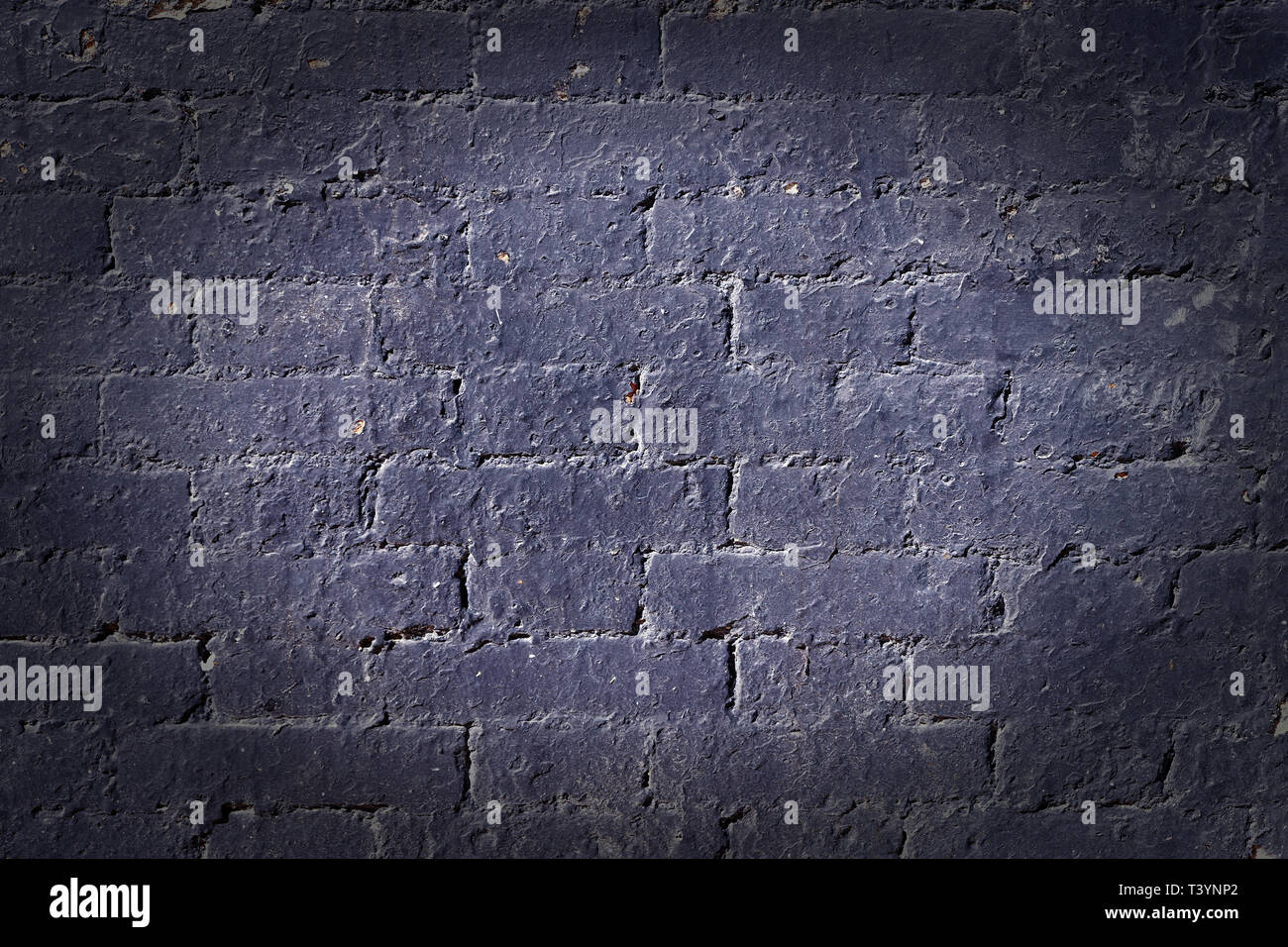 Old brick wall grunge background texture dark vignette Stock Photo