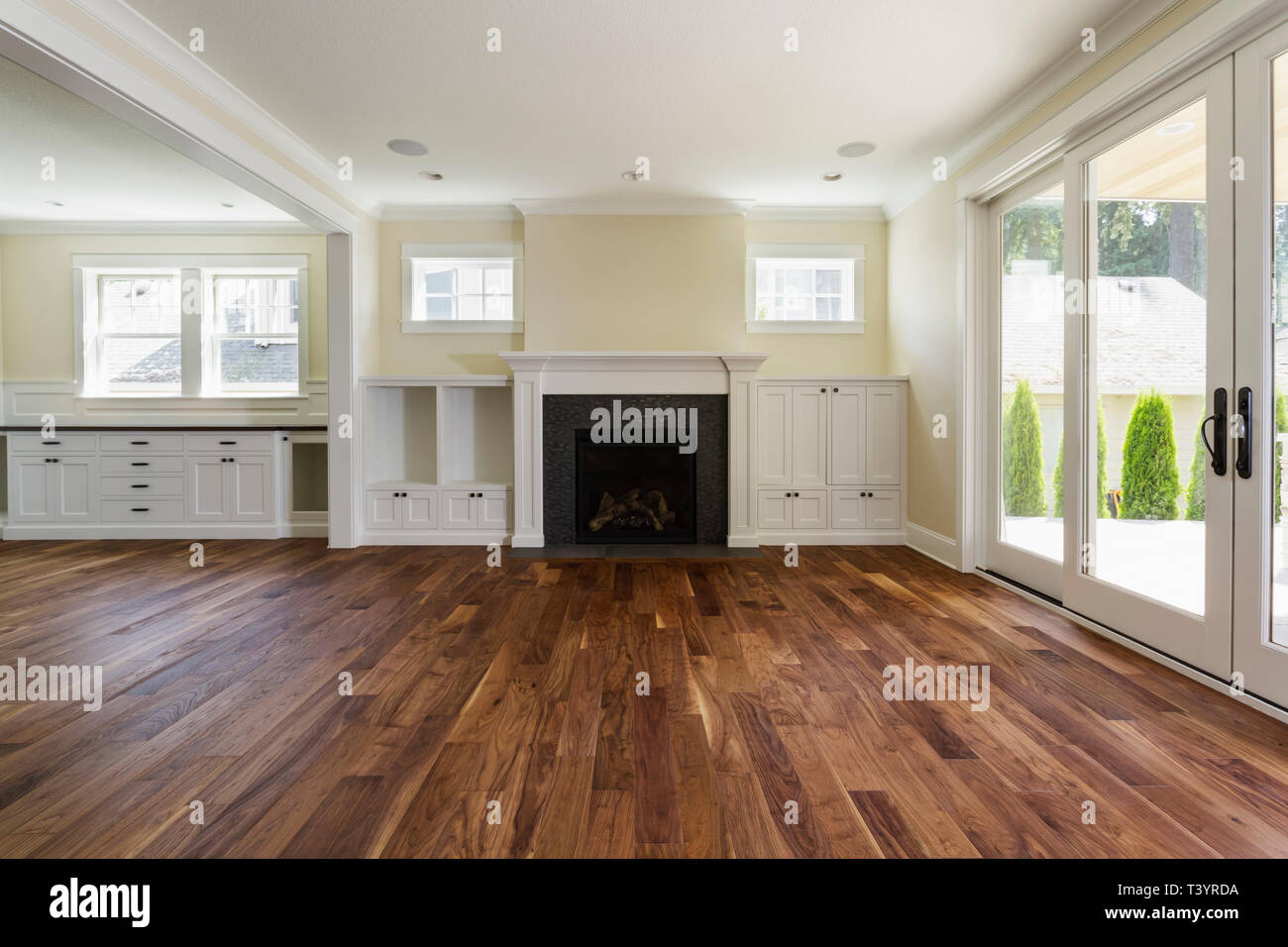 Fireplace And Built In Shelves In Living Room Stock Photo
