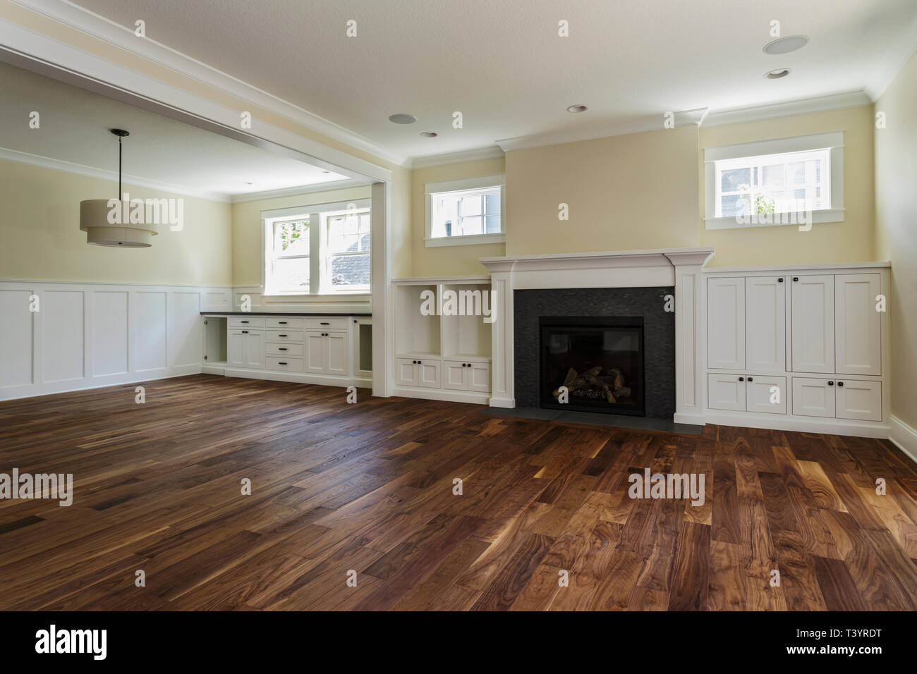 Fireplace And Built In Shelves In Living Room Stock Photo