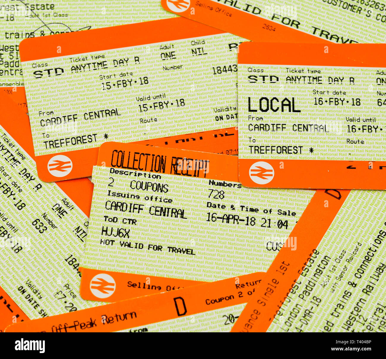 CARDIFF, WALES - APRIL 2019: Close up view of traditional printed rail tickets with the National Rail logo. Stock Photo